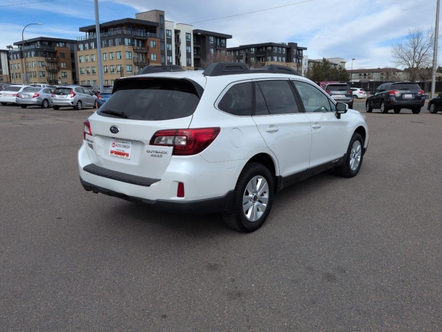 2017 WHITE Subaru Outback Premium (4S4BSACC9H3) with an 4 Cyl, 2.5L engine, Automatic transmission, located at 10890 W. Colfax Ave., Lakewood, CO, 80215, (303) 274-7692, 39.739914, -105.120132 - Photo#4