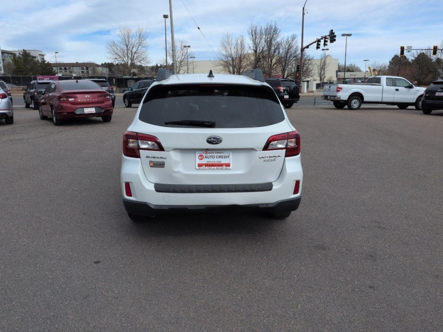 2017 WHITE Subaru Outback Premium (4S4BSACC9H3) with an 4 Cyl, 2.5L engine, Automatic transmission, located at 10890 W. Colfax Ave., Lakewood, CO, 80215, (303) 274-7692, 39.739914, -105.120132 - Photo#5