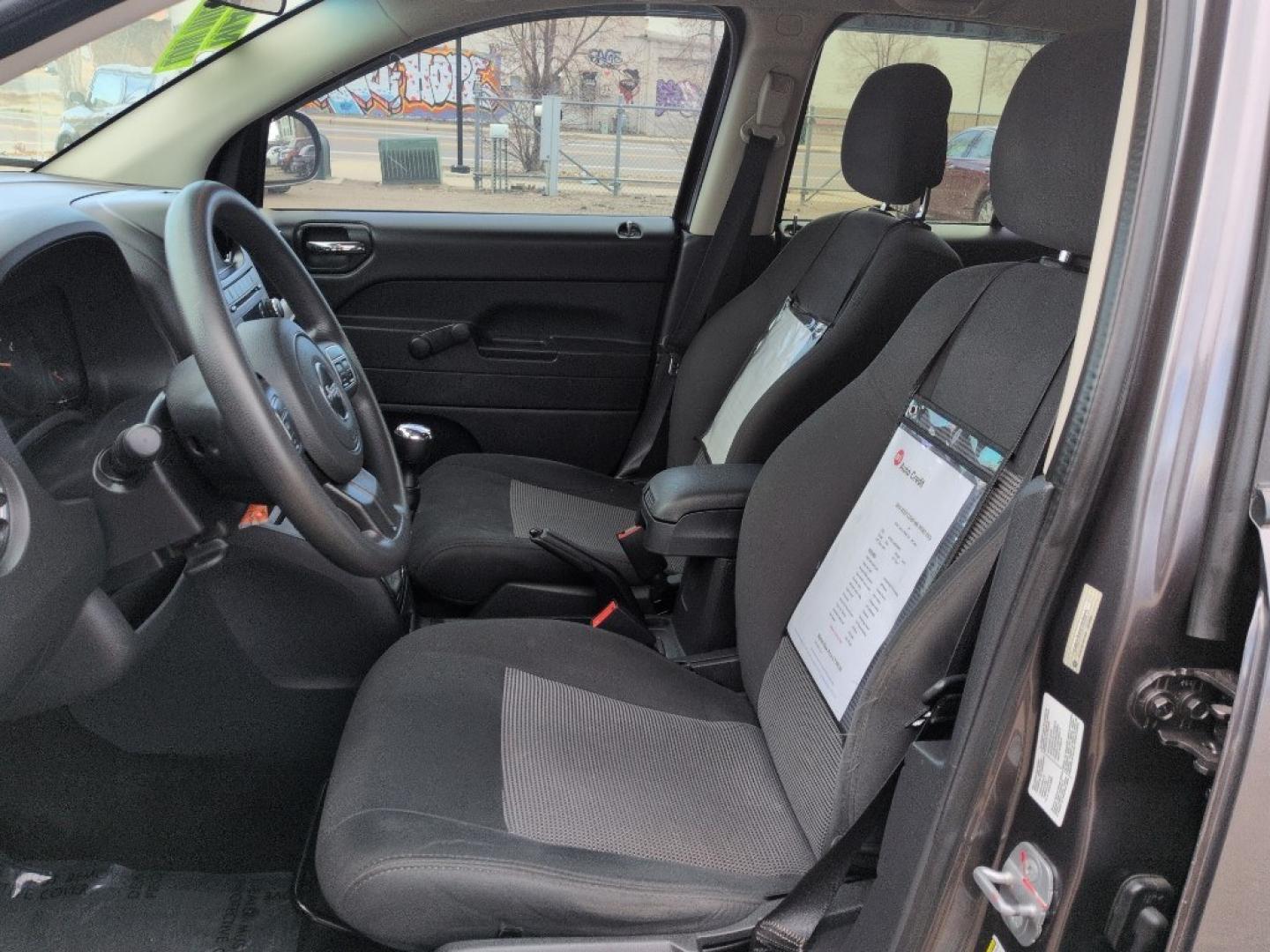 2014 GRAY Jeep Compass Sport (1C4NJCAA5ED) with an 4 Cyl, 2.0L engine, Manual transmission, located at 10890 W. Colfax Ave., Lakewood, CO, 80215, (303) 274-7692, 39.739914, -105.120132 - Photo#9