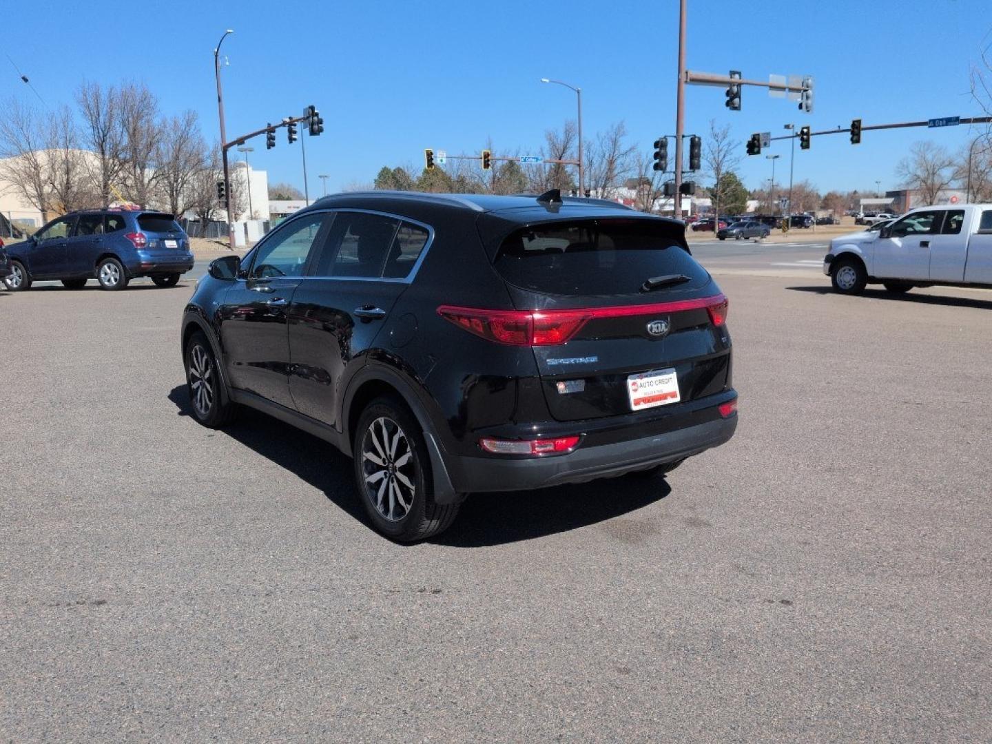 2017 BLACK Kia Sportage EX (KNDPNCAC8H7) with an 4 Cyl, 2.4L engine, Automatic transmission, located at 10890 W. Colfax Ave., Lakewood, CO, 80215, (303) 274-7692, 39.739914, -105.120132 - Photo#6