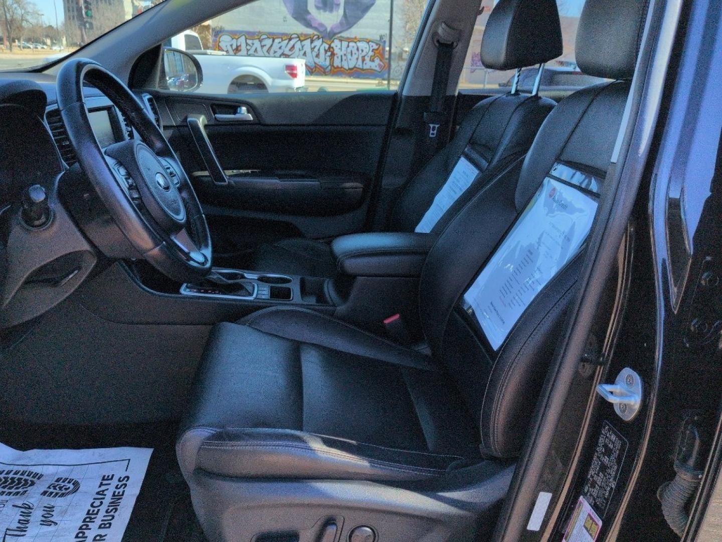 2017 BLACK Kia Sportage EX (KNDPNCAC8H7) with an 4 Cyl, 2.4L engine, Automatic transmission, located at 10890 W. Colfax Ave., Lakewood, CO, 80215, (303) 274-7692, 39.739914, -105.120132 - Photo#9