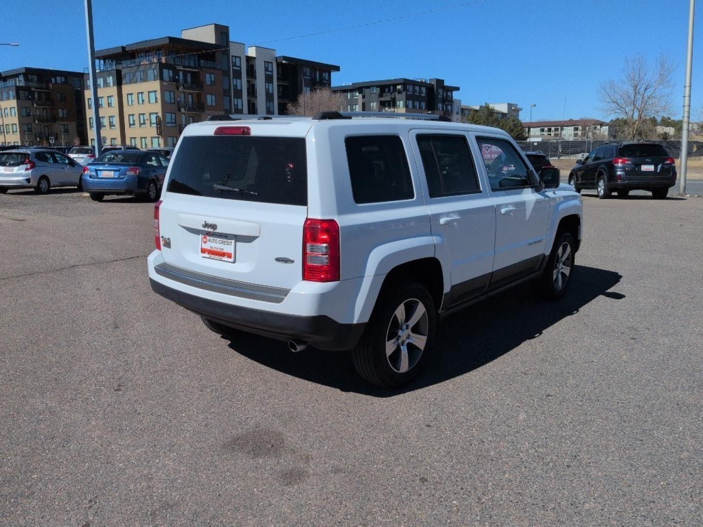 2016 WHITE Jeep Patriot Latitude (1C4NJRFBXGD) with an 4 Cyl, 2.4L engine, Automatic transmission, located at 10890 W. Colfax Ave., Lakewood, CO, 80215, (303) 274-7692, 39.739914, -105.120132 - Photo#4