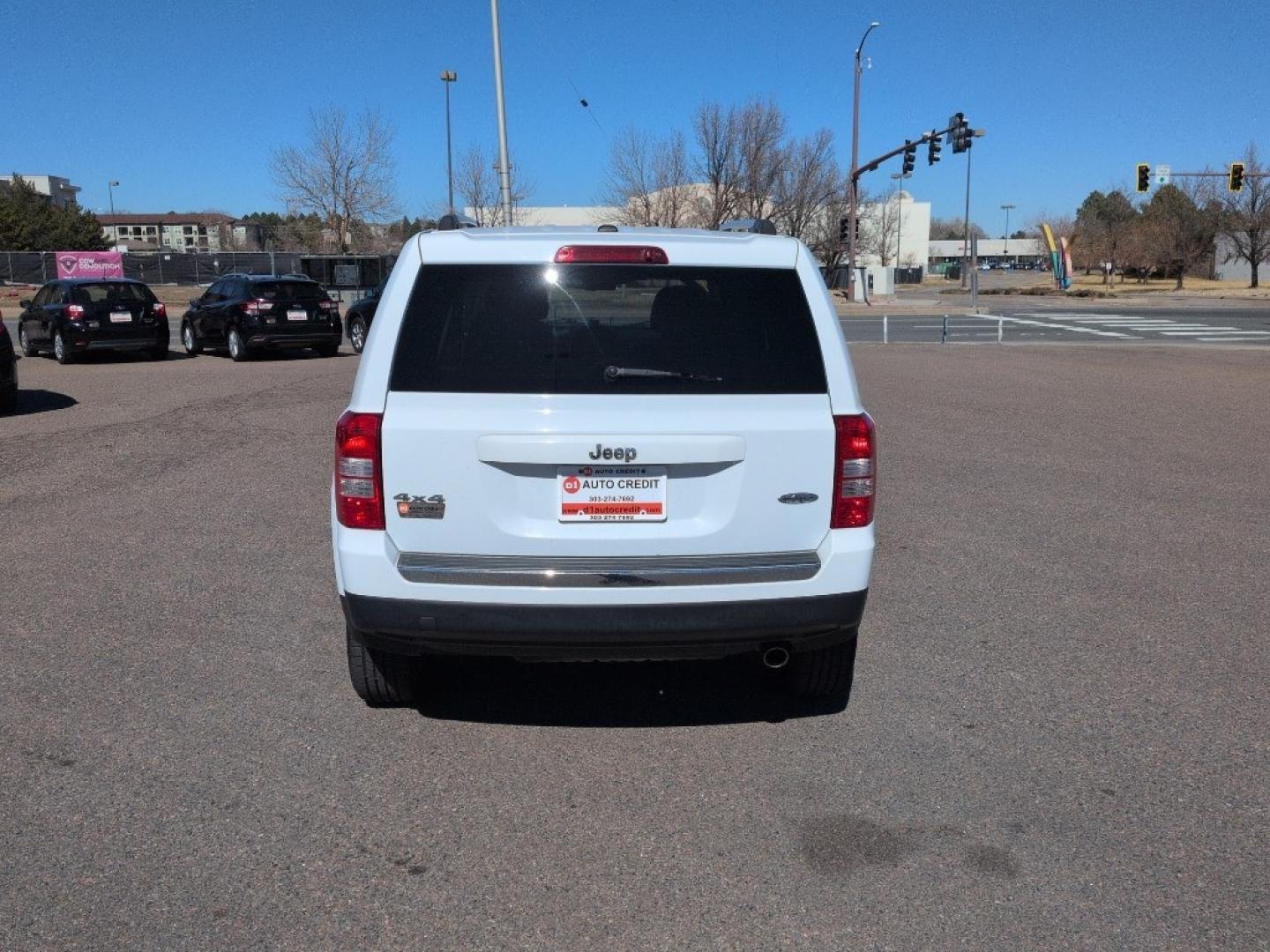 2016 WHITE Jeep Patriot Latitude (1C4NJRFBXGD) with an 4 Cyl, 2.4L engine, Automatic transmission, located at 10890 W. Colfax Ave., Lakewood, CO, 80215, (303) 274-7692, 39.739914, -105.120132 - Photo#5
