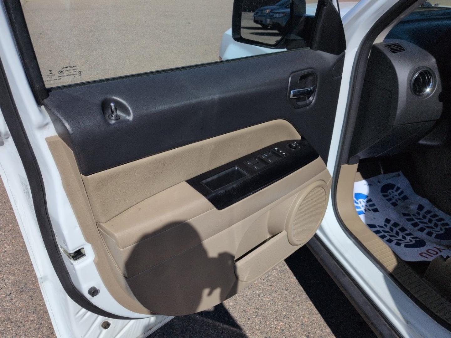 2016 WHITE Jeep Patriot Latitude (1C4NJRFBXGD) with an 4 Cyl, 2.4L engine, Automatic transmission, located at 10890 W. Colfax Ave., Lakewood, CO, 80215, (303) 274-7692, 39.739914, -105.120132 - Photo#8