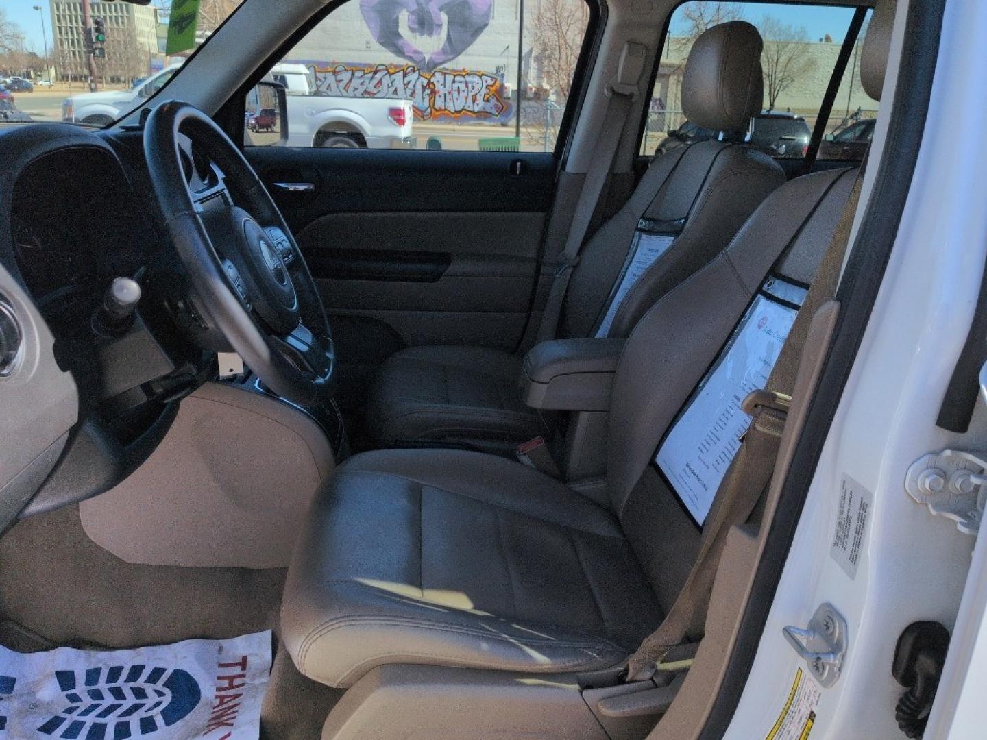 2016 WHITE Jeep Patriot Latitude (1C4NJRFBXGD) with an 4 Cyl, 2.4L engine, Automatic transmission, located at 10890 W. Colfax Ave., Lakewood, CO, 80215, (303) 274-7692, 39.739914, -105.120132 - Photo#9
