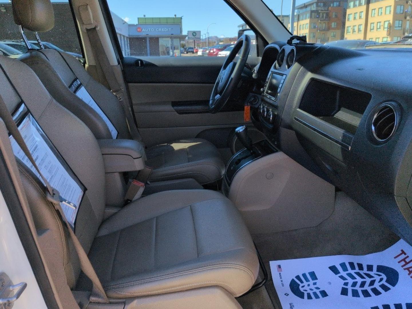 2016 WHITE Jeep Patriot Latitude (1C4NJRFBXGD) with an 4 Cyl, 2.4L engine, Automatic transmission, located at 10890 W. Colfax Ave., Lakewood, CO, 80215, (303) 274-7692, 39.739914, -105.120132 - Photo#19