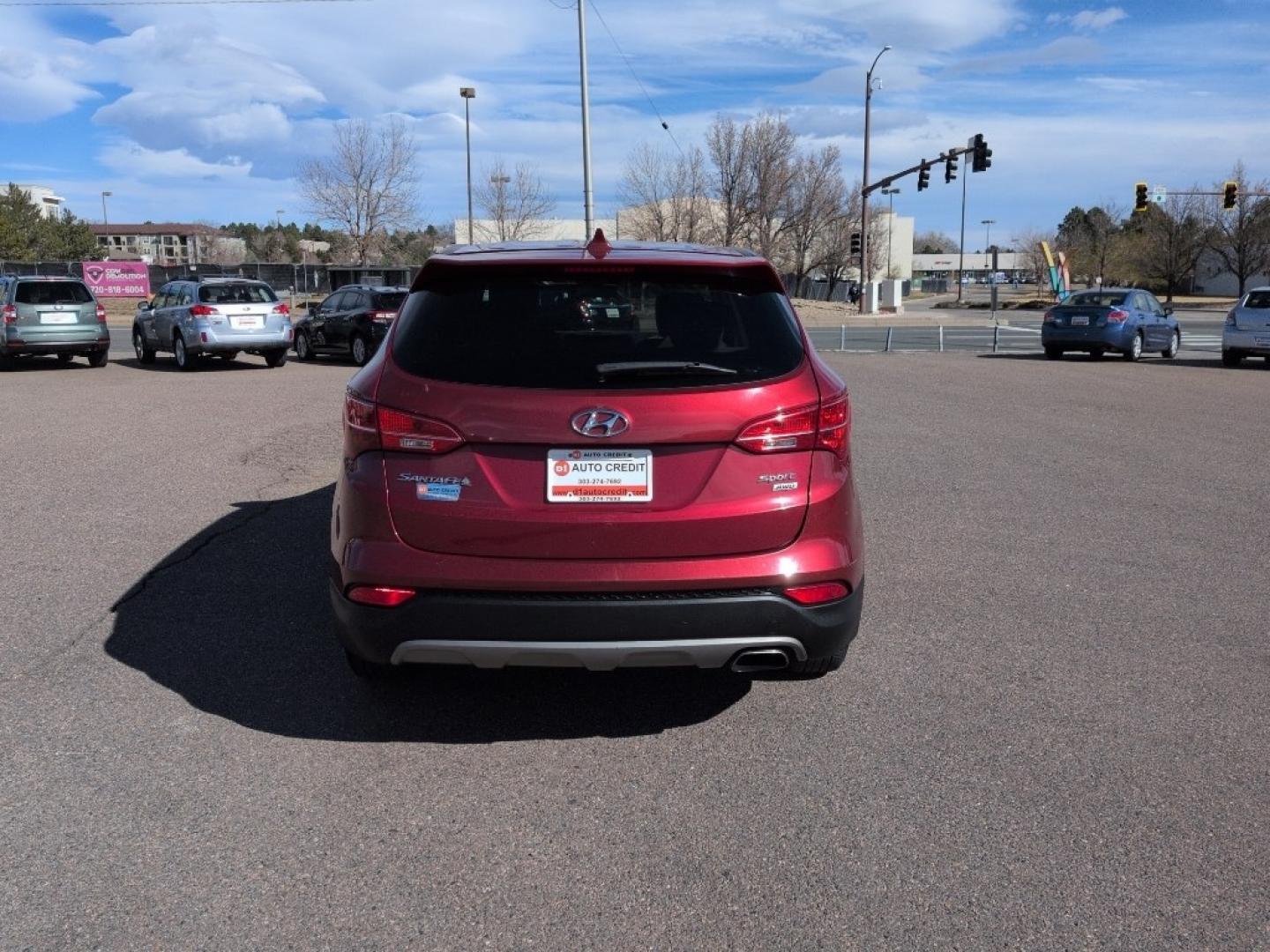 2016 RED Hyundai Santa Fe Sport Base (5XYZTDLB6GG) with an 4 Cyl, 2.4L engine, Automatic transmission, located at 10890 W. Colfax Ave., Lakewood, CO, 80215, (303) 274-7692, 39.739914, -105.120132 - Photo#5