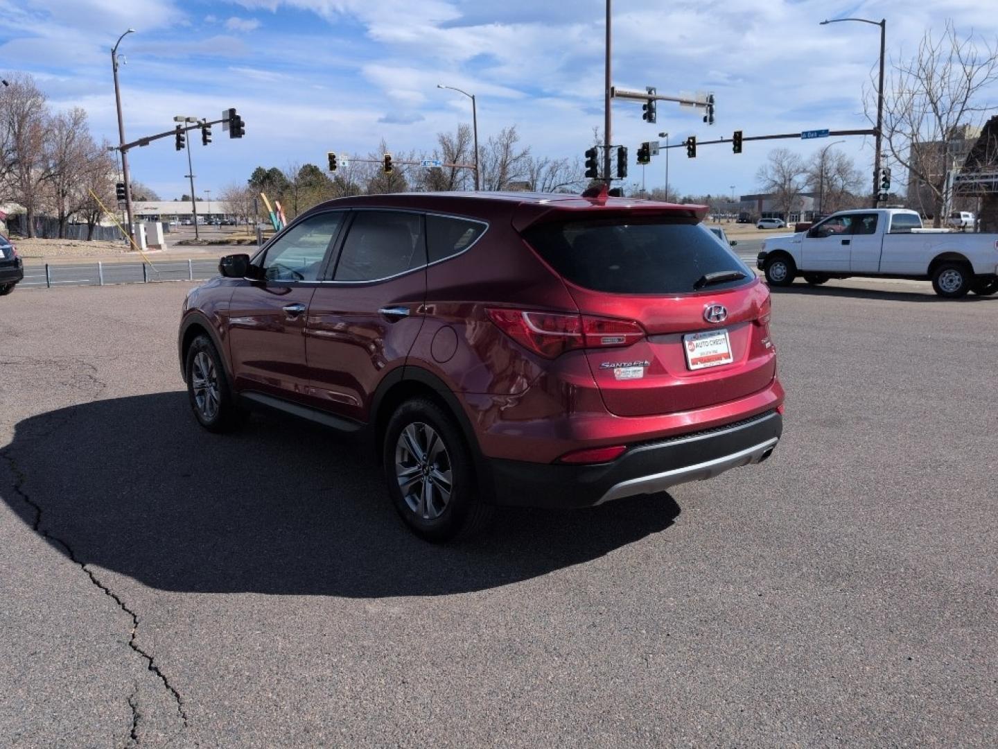2016 RED Hyundai Santa Fe Sport Base (5XYZTDLB6GG) with an 4 Cyl, 2.4L engine, Automatic transmission, located at 10890 W. Colfax Ave., Lakewood, CO, 80215, (303) 274-7692, 39.739914, -105.120132 - Photo#6