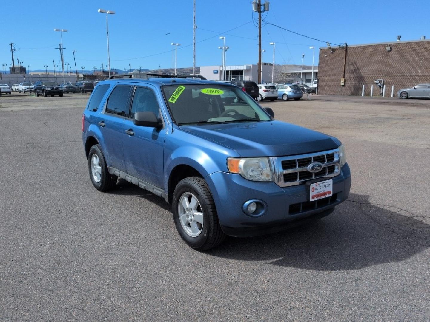2009 BLUE Ford Escape XLT (1FMCU03779K) with an 4 Cyl, 2.5L engine, Automatic transmission, located at 10890 W. Colfax Ave., Lakewood, CO, 80215, (303) 274-7692, 39.739914, -105.120132 - Photo#2