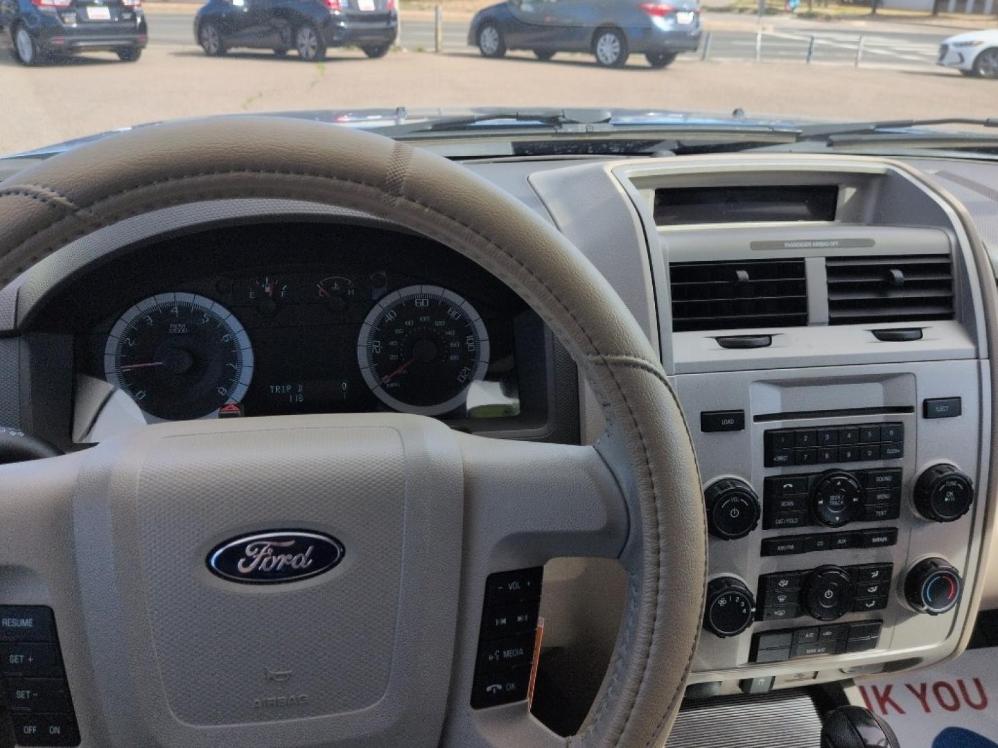 2009 BLUE Ford Escape XLT (1FMCU03779K) with an 4 Cyl, 2.5L engine, Automatic transmission, located at 10890 W. Colfax Ave., Lakewood, CO, 80215, (303) 274-7692, 39.739914, -105.120132 - Photo#10