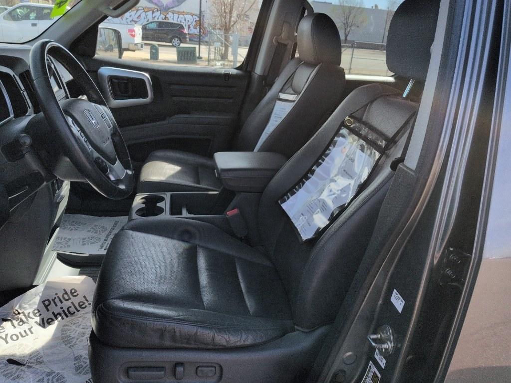 2007 GRAY Honda Ridgeline RTL (2HJYK16597H) with an V6, 3.5L engine, Automatic transmission, located at 10890 W. Colfax Ave., Lakewood, CO, 80215, (303) 274-7692, 39.739914, -105.120132 - Photo#9