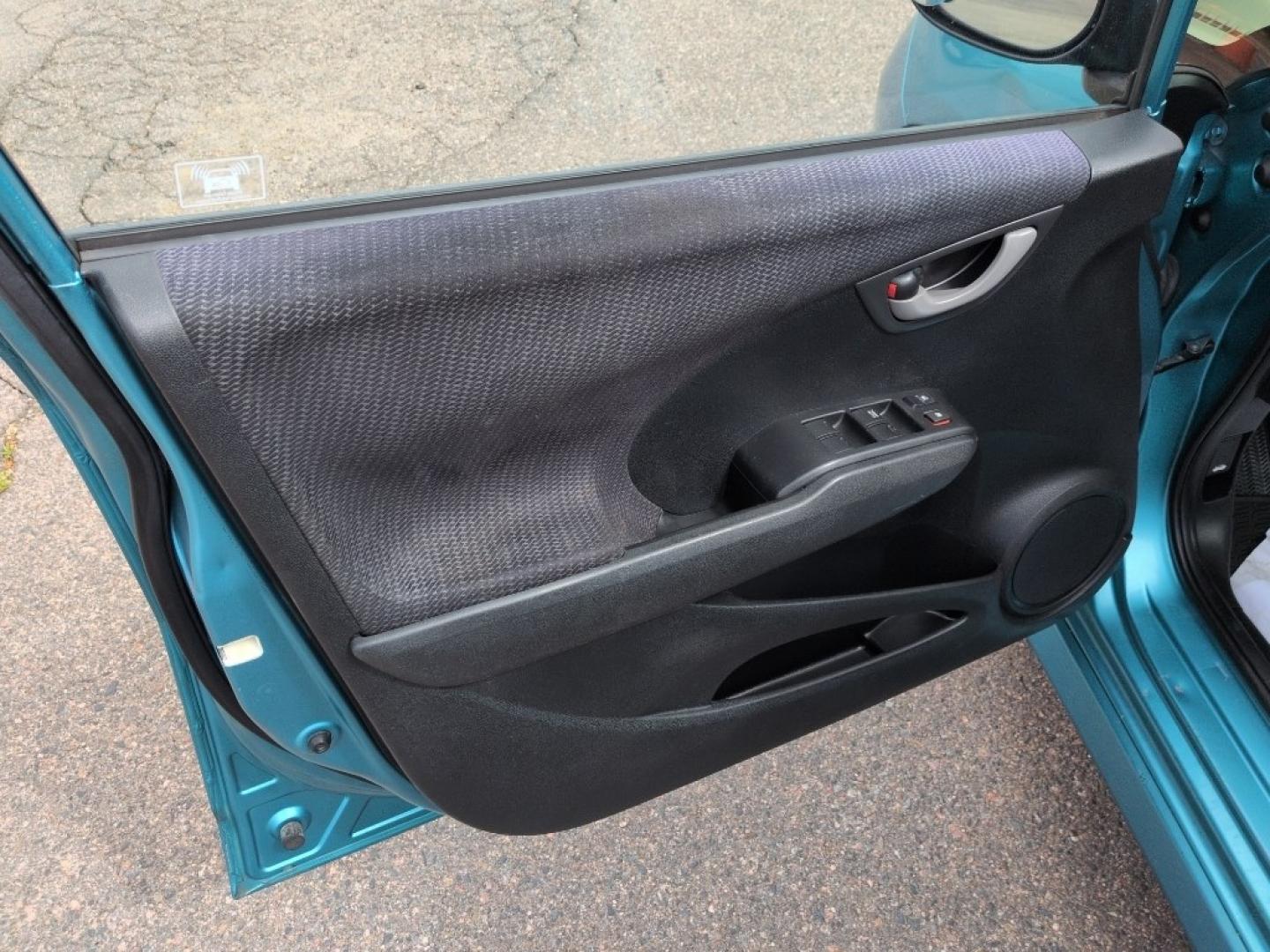 2013 TEAL Honda Fit Sport (JHMGE8H56DC) with an 4 Cyl, 1.5L engine, Automatic transmission, located at 10890 W. Colfax Ave., Lakewood, CO, 80215, (303) 274-7692, 39.739914, -105.120132 - Photo#12