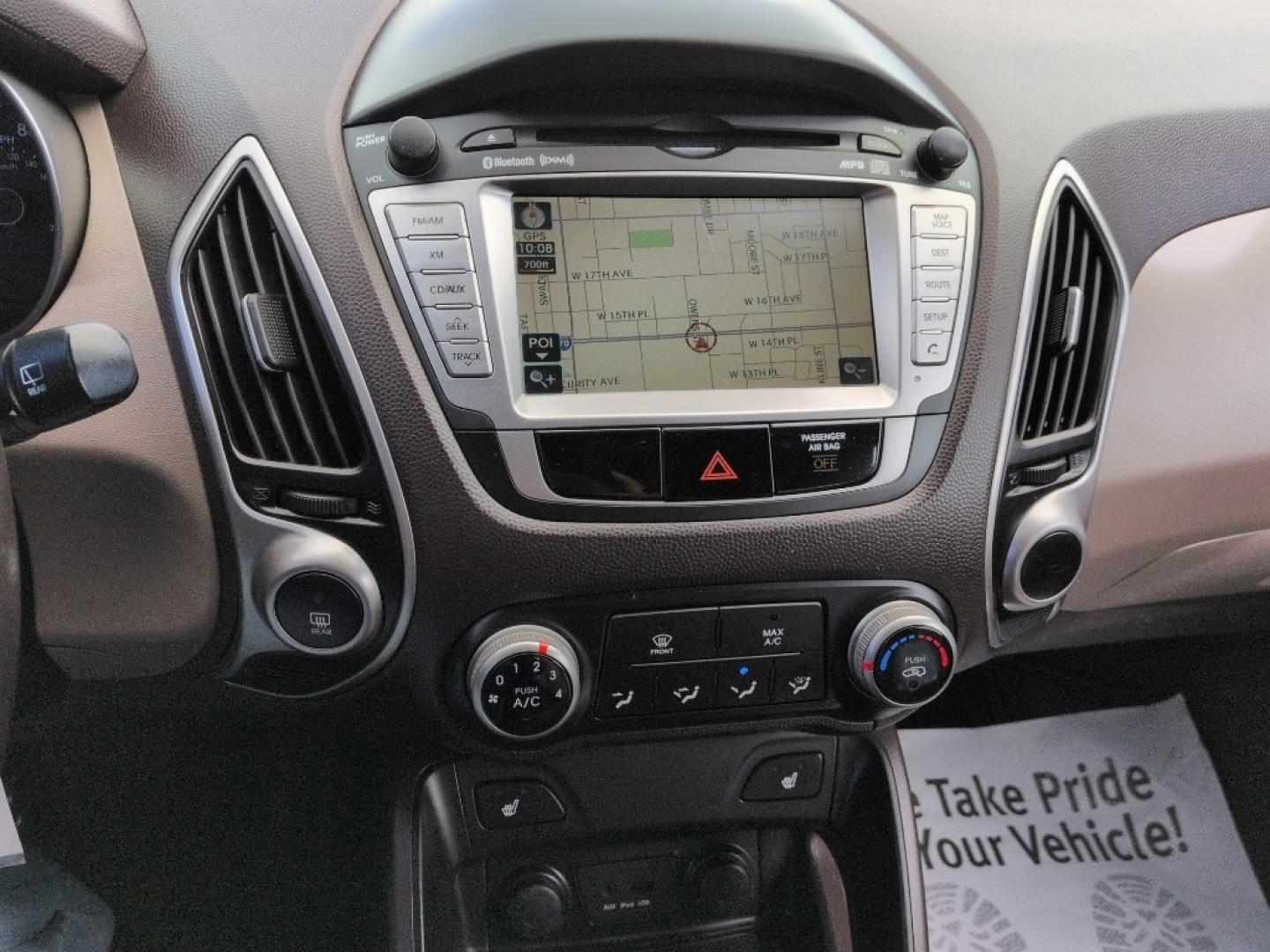 2011 WHITE Hyundai Tucson LIMITED AUTO AWD (KM8JUCAC4BU) with an 4 Cyl, 2.4L engine, Automatic transmission, located at 10890 W. Colfax Ave., Lakewood, CO, 80215, (303) 274-7692, 39.739914, -105.120132 - Photo#10
