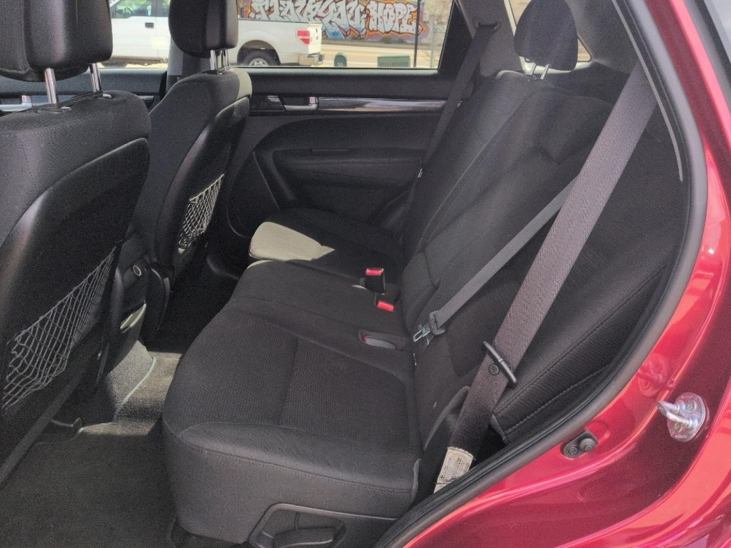 2014 RED Kia Sorento LX V6 AWD (5XYKTDA7XEG) with an V6, 3.3L engine, Automatic transmission, located at 10890 W. Colfax Ave., Lakewood, CO, 80215, (303) 274-7692, 39.739914, -105.120132 - Photo#15