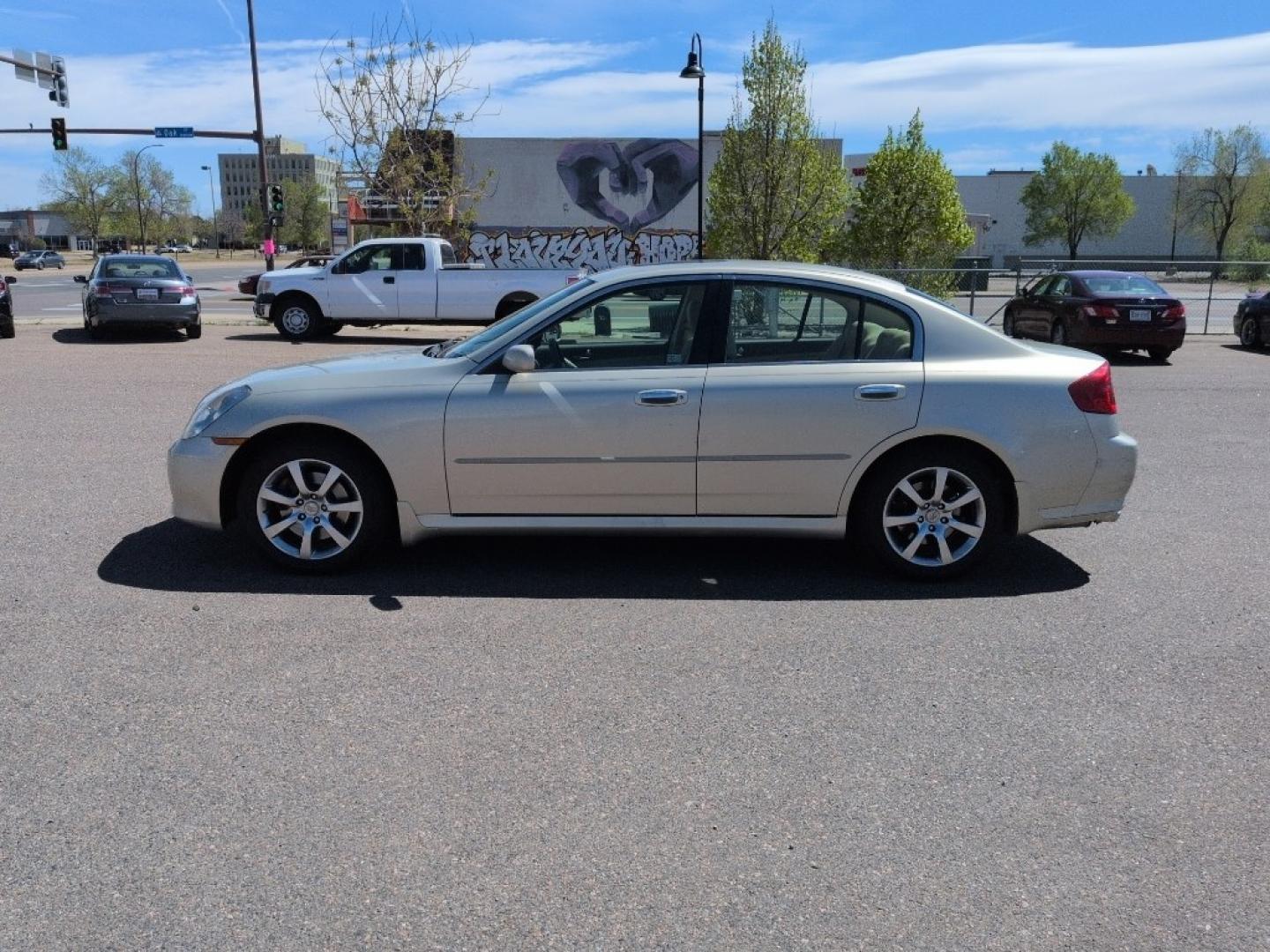 2006 GOLD INFINITI G35 Base (JNKCV51F26M) with an V6, 3.5L engine, Automatic transmission, located at 10890 W. Colfax Ave., Lakewood, CO, 80215, (303) 274-7692, 39.739914, -105.120132 - Photo#7