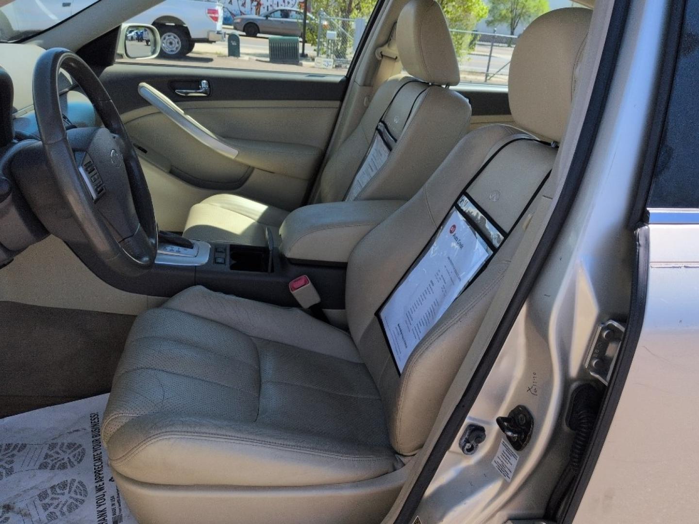 2006 GOLD INFINITI G35 Base (JNKCV51F26M) with an V6, 3.5L engine, Automatic transmission, located at 10890 W. Colfax Ave., Lakewood, CO, 80215, (303) 274-7692, 39.739914, -105.120132 - Photo#9