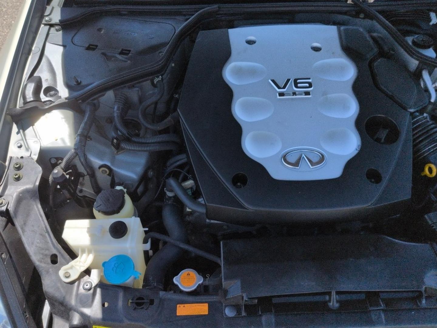 2006 GOLD INFINITI G35 Base (JNKCV51F26M) with an V6, 3.5L engine, Automatic transmission, located at 10890 W. Colfax Ave., Lakewood, CO, 80215, (303) 274-7692, 39.739914, -105.120132 - Photo#24