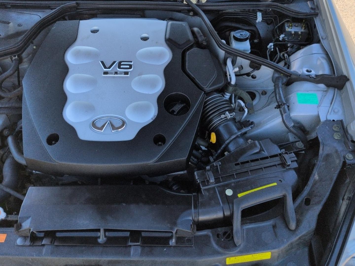 2006 GOLD INFINITI G35 Base (JNKCV51F26M) with an V6, 3.5L engine, Automatic transmission, located at 10890 W. Colfax Ave., Lakewood, CO, 80215, (303) 274-7692, 39.739914, -105.120132 - Photo#25