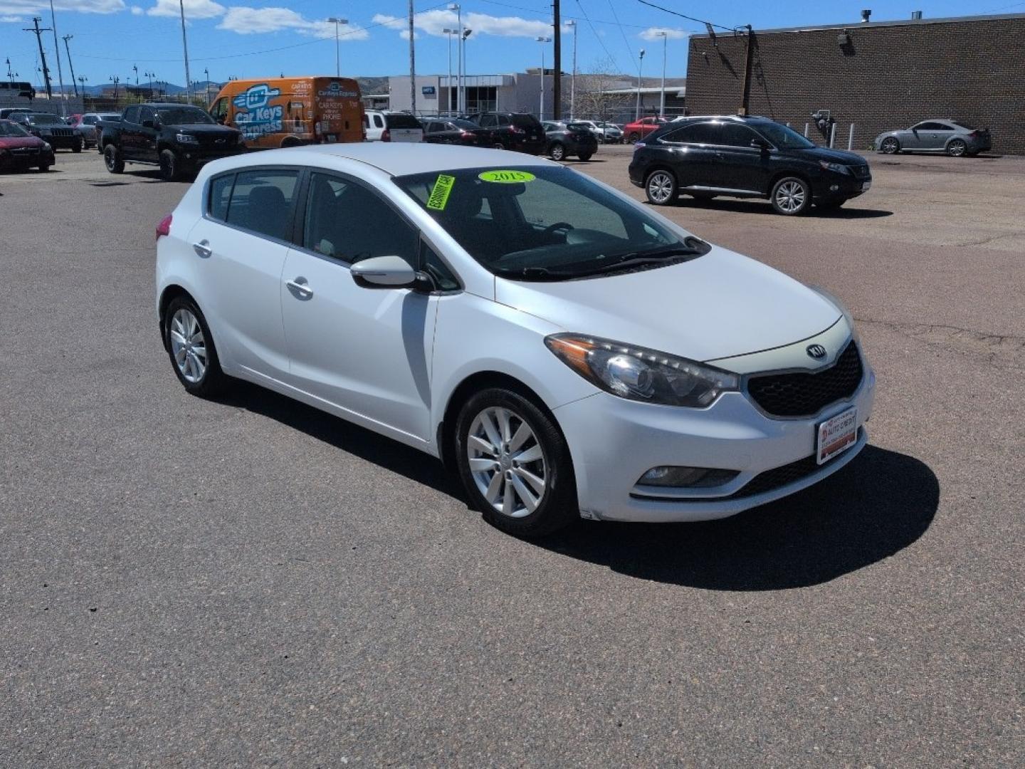 2015 WHITE Kia Forte5 EX (KNAFX5A85F5) with an 4 Cyl, 2.0L engine, Automatic transmission, located at 10890 W. Colfax Ave., Lakewood, CO, 80215, (303) 274-7692, 39.739914, -105.120132 - Photo#2