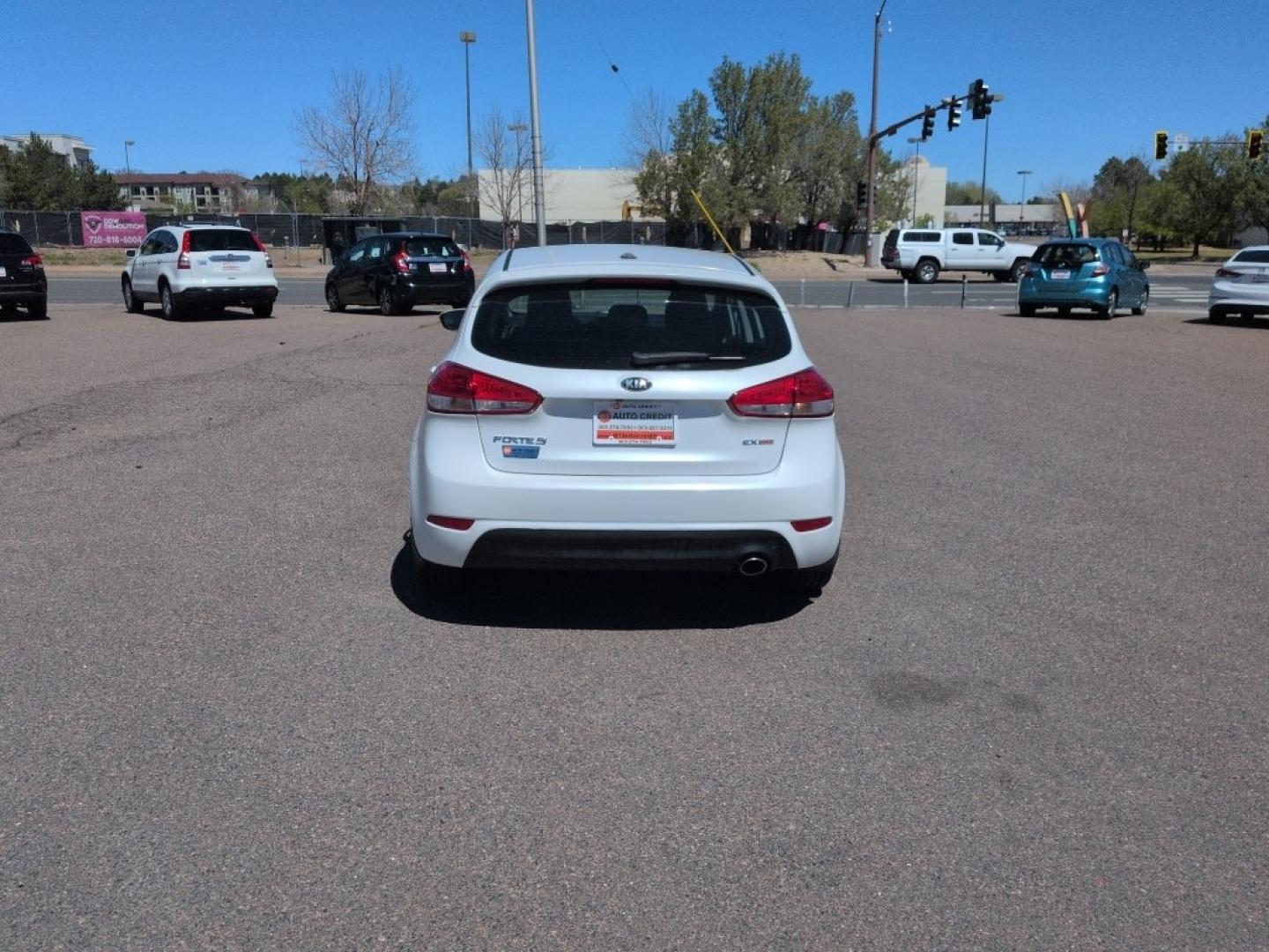 2015 WHITE Kia Forte5 EX (KNAFX5A85F5) with an 4 Cyl, 2.0L engine, Automatic transmission, located at 10890 W. Colfax Ave., Lakewood, CO, 80215, (303) 274-7692, 39.739914, -105.120132 - Photo#5