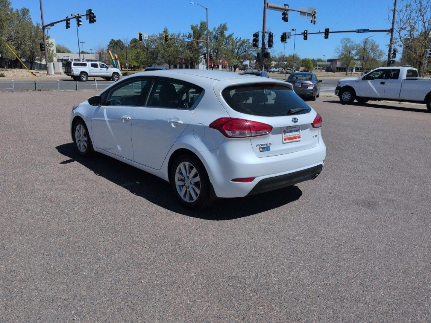2015 WHITE Kia Forte5 EX (KNAFX5A85F5) with an 4 Cyl, 2.0L engine, Automatic transmission, located at 10890 W. Colfax Ave., Lakewood, CO, 80215, (303) 274-7692, 39.739914, -105.120132 - Photo#6