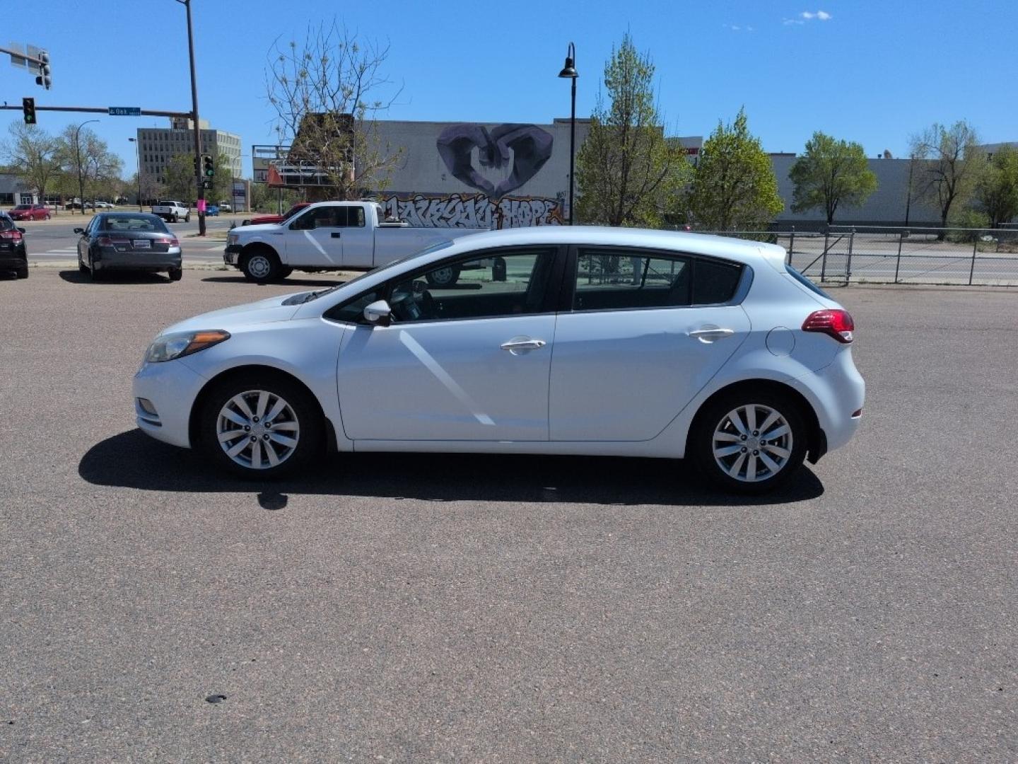 2015 WHITE Kia Forte5 EX (KNAFX5A85F5) with an 4 Cyl, 2.0L engine, Automatic transmission, located at 10890 W. Colfax Ave., Lakewood, CO, 80215, (303) 274-7692, 39.739914, -105.120132 - Photo#7