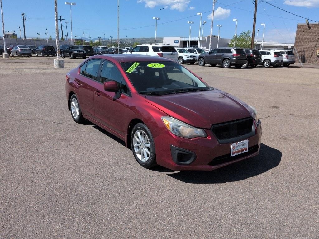 2014 RED Subaru Impreza Premium AWP (JF1GJAC60EH) with an 4 Cyl, 2.0L engine, Automatic transmission, located at 10890 W. Colfax Ave., Lakewood, CO, 80215, (303) 274-7692, 39.739914, -105.120132 - Photo#2