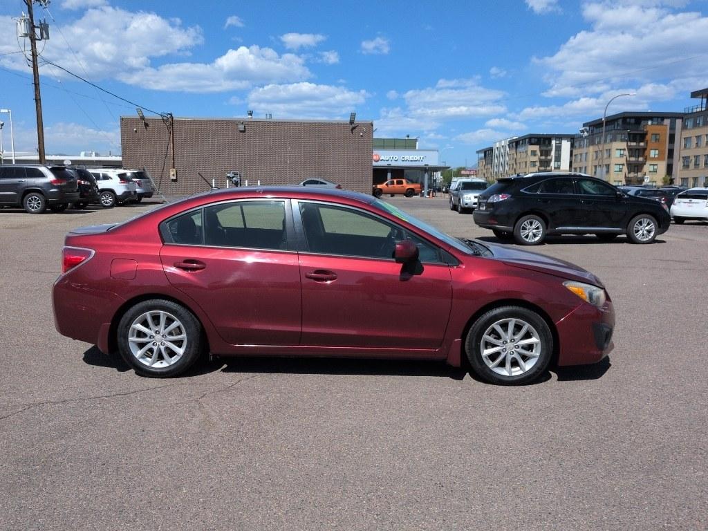2014 RED Subaru Impreza Premium AWP (JF1GJAC60EH) with an 4 Cyl, 2.0L engine, Automatic transmission, located at 10890 W. Colfax Ave., Lakewood, CO, 80215, (303) 274-7692, 39.739914, -105.120132 - Photo#3