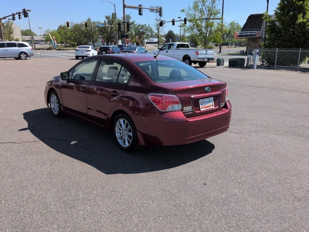 2014 RED Subaru Impreza Premium AWP (JF1GJAC60EH) with an 4 Cyl, 2.0L engine, Automatic transmission, located at 10890 W. Colfax Ave., Lakewood, CO, 80215, (303) 274-7692, 39.739914, -105.120132 - Photo#6