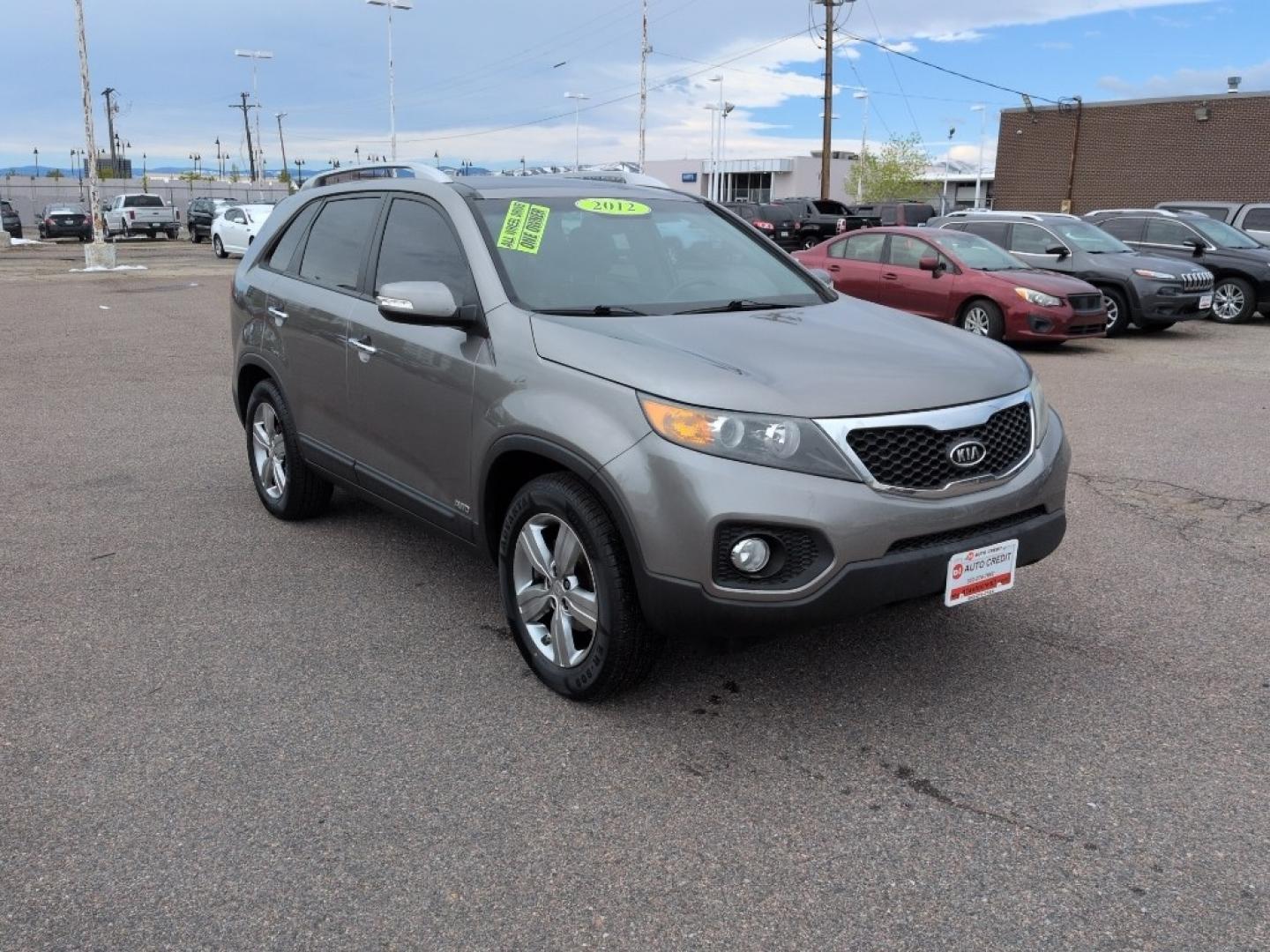 2012 SILVER Kia Sorento EX V6 4WD (5XYKUDA29CG) with an V6, 3.5L engine, Automatic transmission, located at 10890 W. Colfax Ave., Lakewood, CO, 80215, (303) 274-7692, 39.739914, -105.120132 - Photo#2
