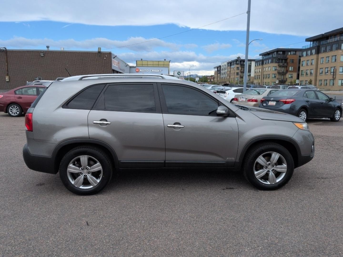 2012 SILVER Kia Sorento EX V6 4WD (5XYKUDA29CG) with an V6, 3.5L engine, Automatic transmission, located at 10890 W. Colfax Ave., Lakewood, CO, 80215, (303) 274-7692, 39.739914, -105.120132 - Photo#3