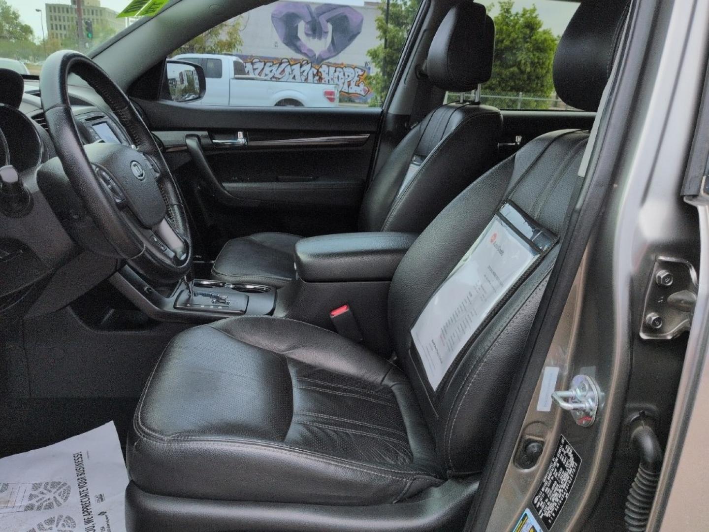 2012 SILVER Kia Sorento EX V6 4WD (5XYKUDA29CG) with an V6, 3.5L engine, Automatic transmission, located at 10890 W. Colfax Ave., Lakewood, CO, 80215, (303) 274-7692, 39.739914, -105.120132 - Photo#9