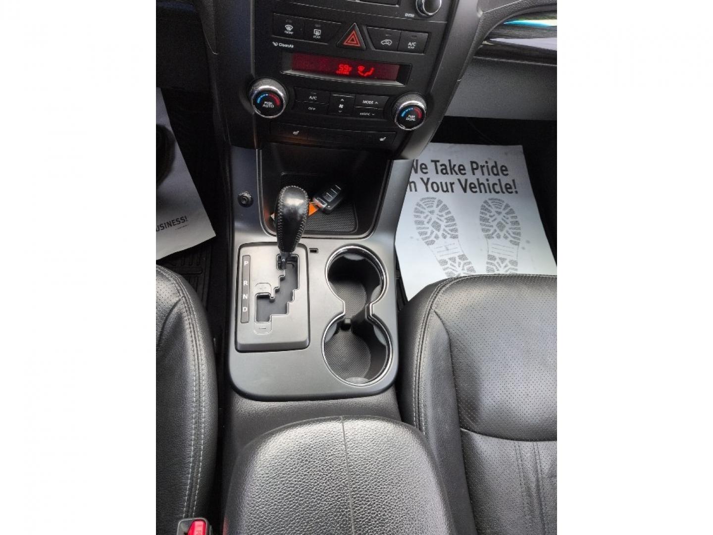 2012 SILVER Kia Sorento EX V6 4WD (5XYKUDA29CG) with an V6, 3.5L engine, Automatic transmission, located at 10890 W. Colfax Ave., Lakewood, CO, 80215, (303) 274-7692, 39.739914, -105.120132 - Photo#13