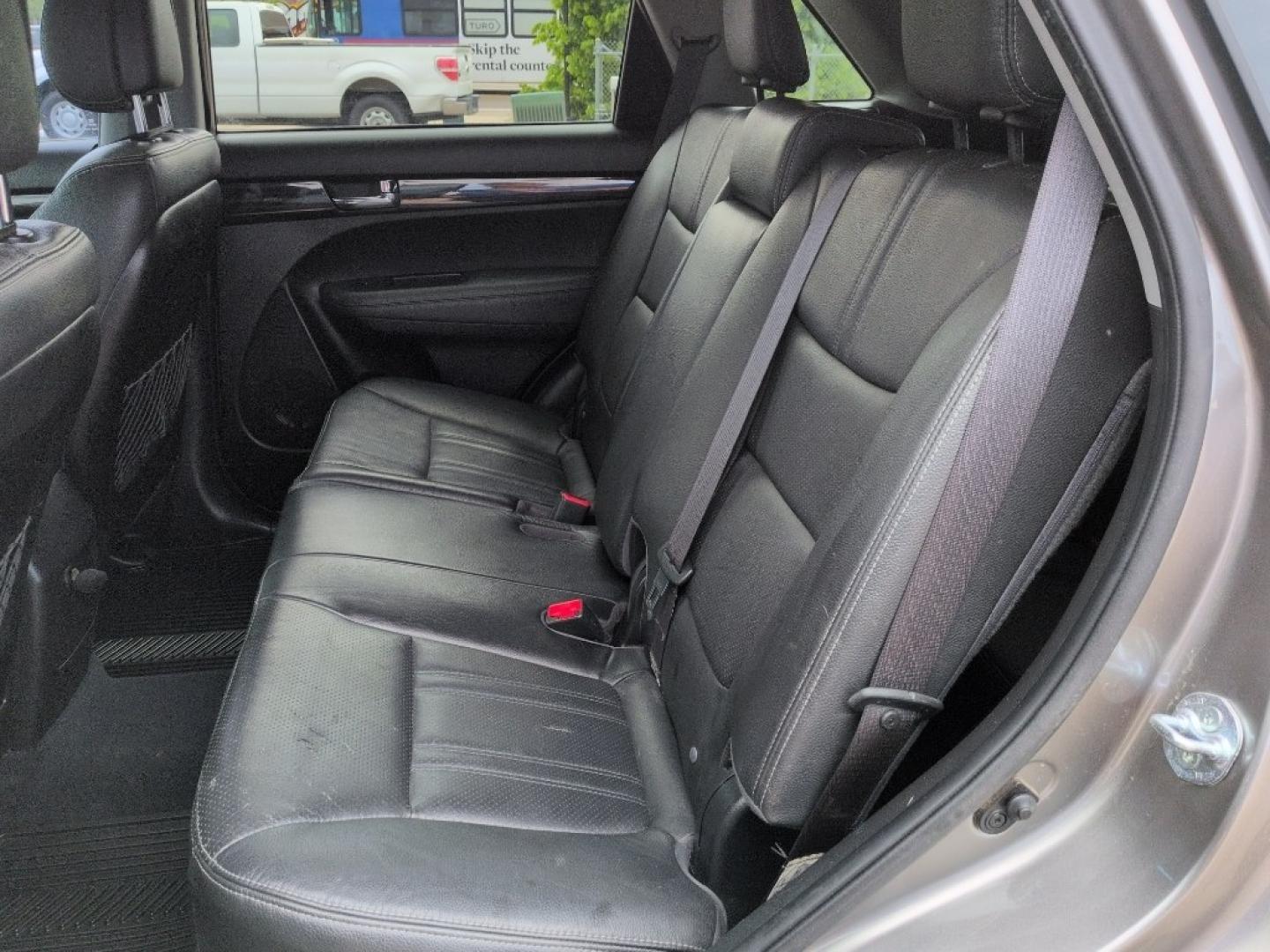 2012 SILVER Kia Sorento EX V6 4WD (5XYKUDA29CG) with an V6, 3.5L engine, Automatic transmission, located at 10890 W. Colfax Ave., Lakewood, CO, 80215, (303) 274-7692, 39.739914, -105.120132 - Photo#16