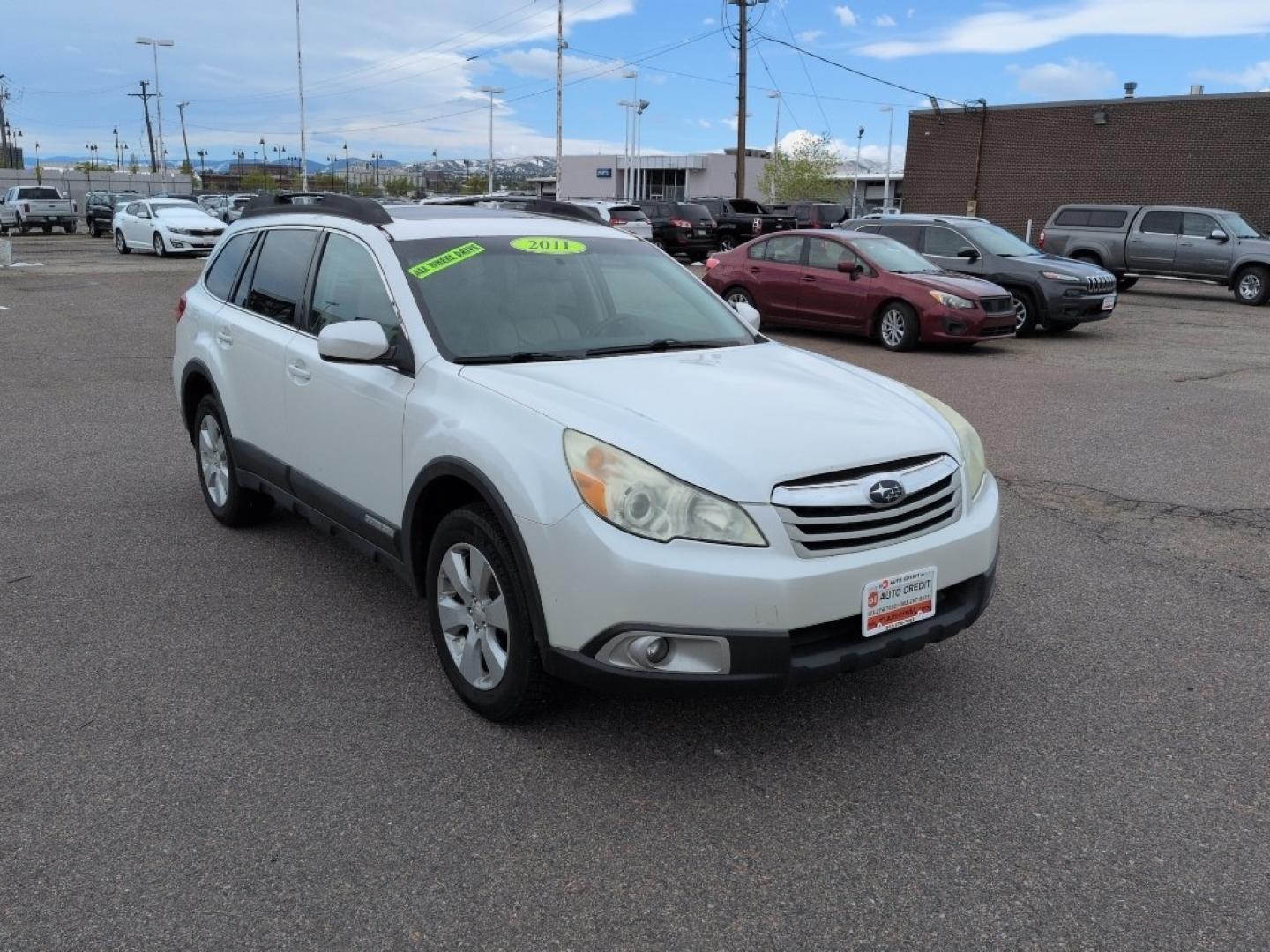 2011 WHITE Subaru Outback 2.5i Premium (4S4BRBGC6B3) with an 4 Cyl, 2.5L engine, Automatic transmission, located at 10890 W. Colfax Ave., Lakewood, CO, 80215, (303) 274-7692, 39.739914, -105.120132- Photo#2