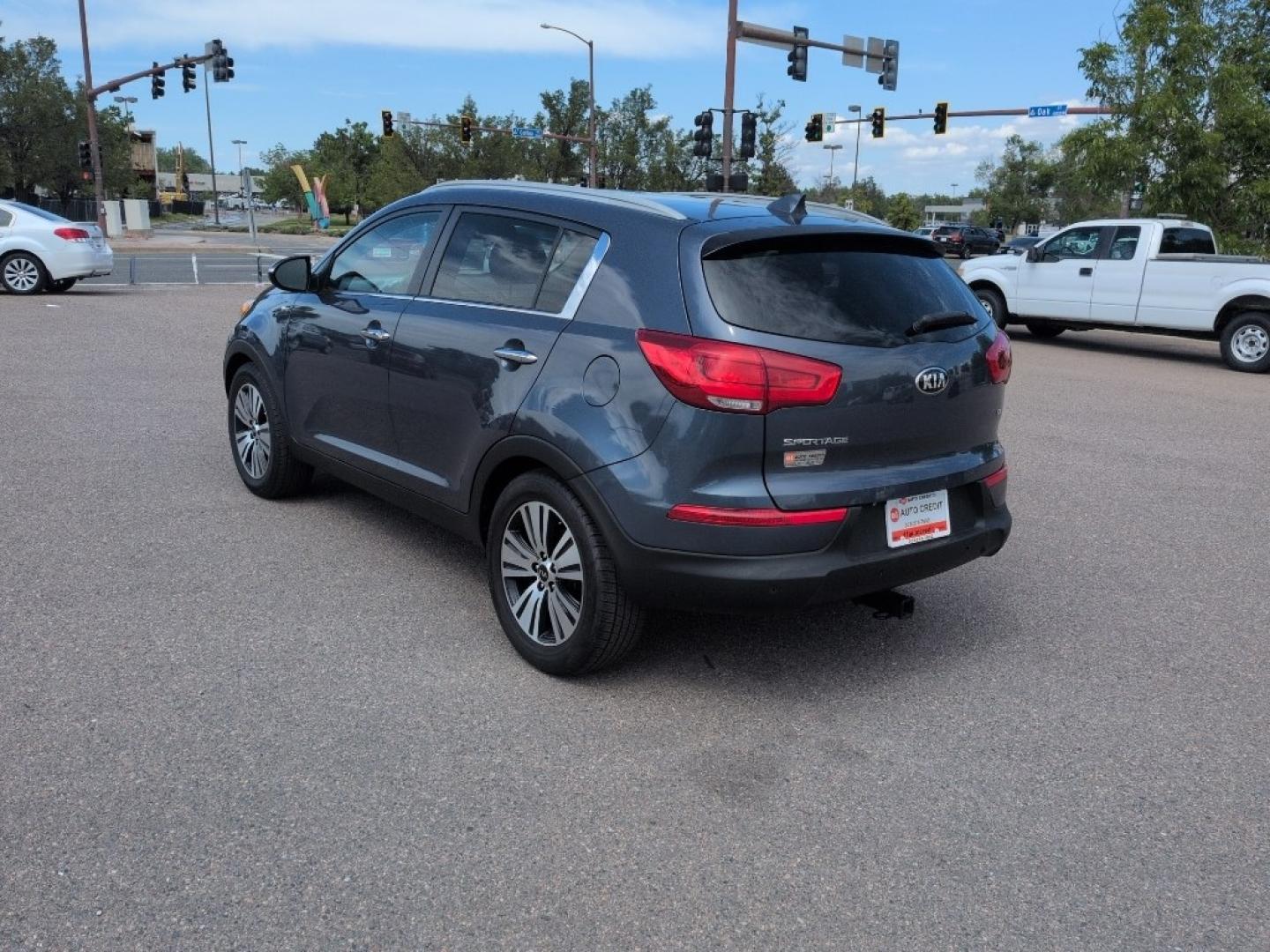 2016 BLUE Kia Sportage EX AWD (KNDPCCAC6G7) with an 4 Cyl, 2.4L engine, Automatic transmission, located at 10890 W. Colfax Ave., Lakewood, CO, 80215, (303) 274-7692, 39.739914, -105.120132- Photo#6