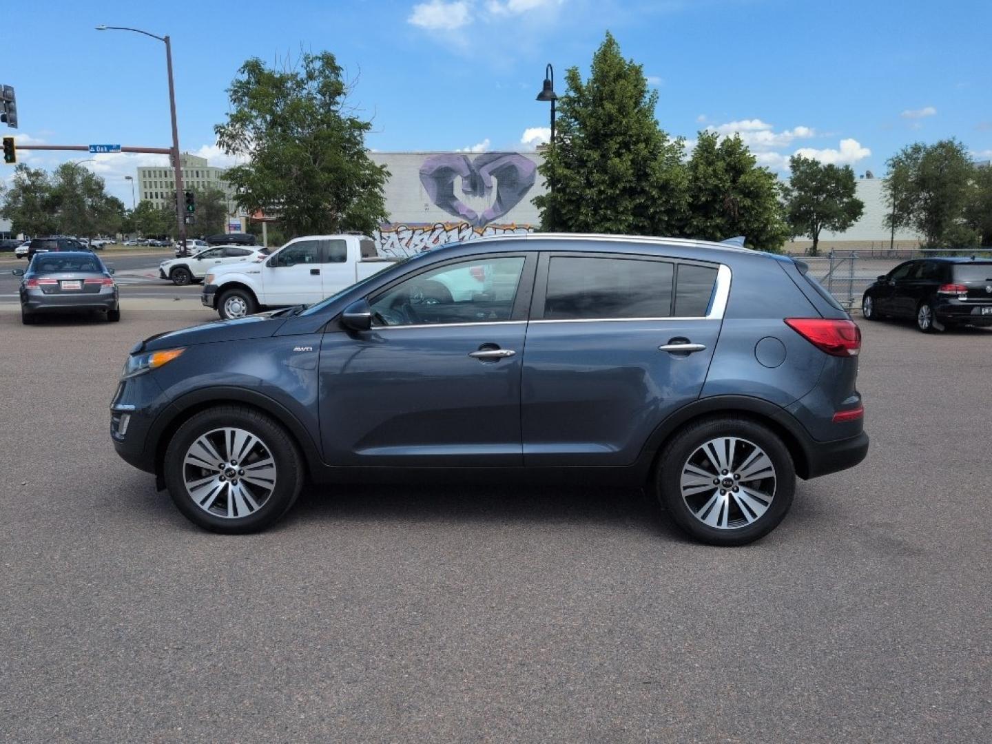 2016 BLUE Kia Sportage EX AWD (KNDPCCAC6G7) with an 4 Cyl, 2.4L engine, Automatic transmission, located at 10890 W. Colfax Ave., Lakewood, CO, 80215, (303) 274-7692, 39.739914, -105.120132- Photo#7