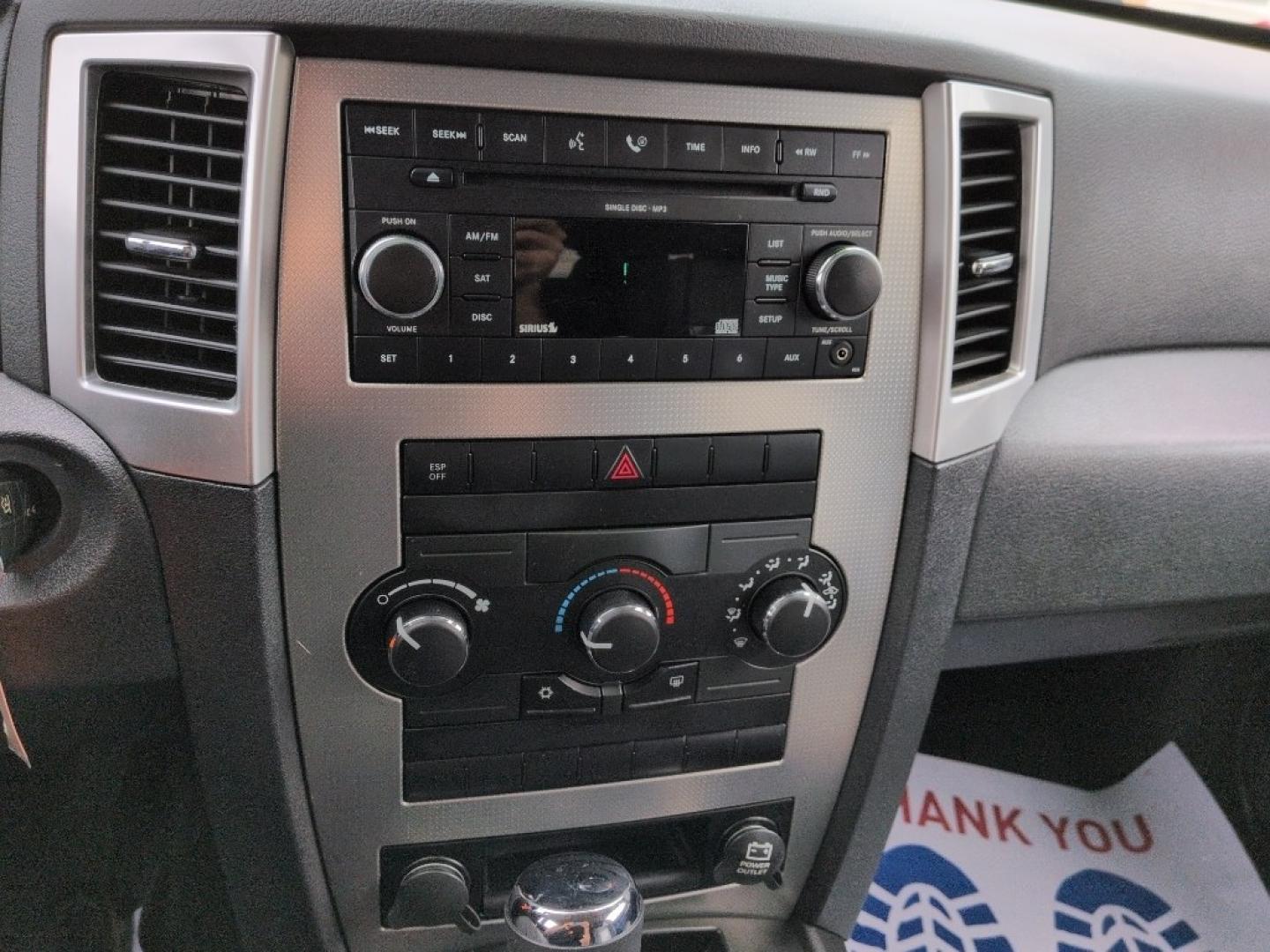 2008 SILVER Jeep Grand Cherokee Laredo (1J8GR48K28C) with an V6, 3.7L (225 CID) engine, Automatic transmission, located at 10890 W. Colfax Ave., Lakewood, CO, 80215, (303) 274-7692, 39.739914, -105.120132- Photo#12