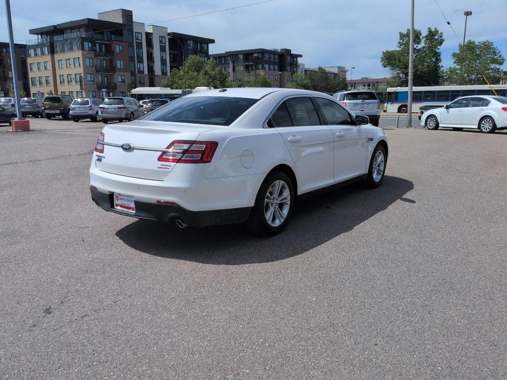 2013 WHITE Ford Taurus SEL (1FAHP2E8XDG) with an V6, 3.5L engine, Automatic transmission, located at 10890 W. Colfax Ave., Lakewood, CO, 80215, (303) 274-7692, 39.739914, -105.120132- Photo#4