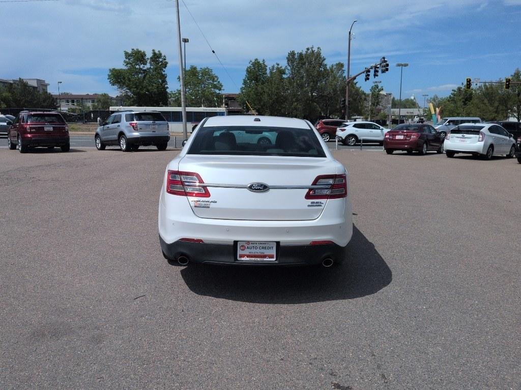 2013 WHITE Ford Taurus SEL (1FAHP2E8XDG) with an V6, 3.5L engine, Automatic transmission, located at 10890 W. Colfax Ave., Lakewood, CO, 80215, (303) 274-7692, 39.739914, -105.120132- Photo#5