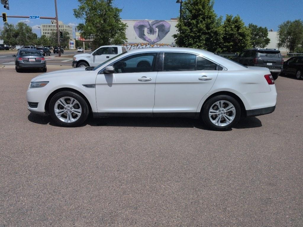 2013 WHITE Ford Taurus SEL (1FAHP2E8XDG) with an V6, 3.5L engine, Automatic transmission, located at 10890 W. Colfax Ave., Lakewood, CO, 80215, (303) 274-7692, 39.739914, -105.120132- Photo#7