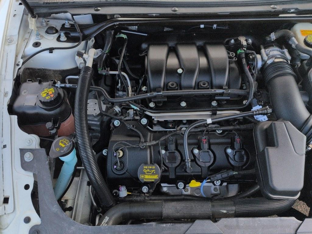 2013 WHITE Ford Taurus SEL (1FAHP2E8XDG) with an V6, 3.5L engine, Automatic transmission, located at 10890 W. Colfax Ave., Lakewood, CO, 80215, (303) 274-7692, 39.739914, -105.120132- Photo#24