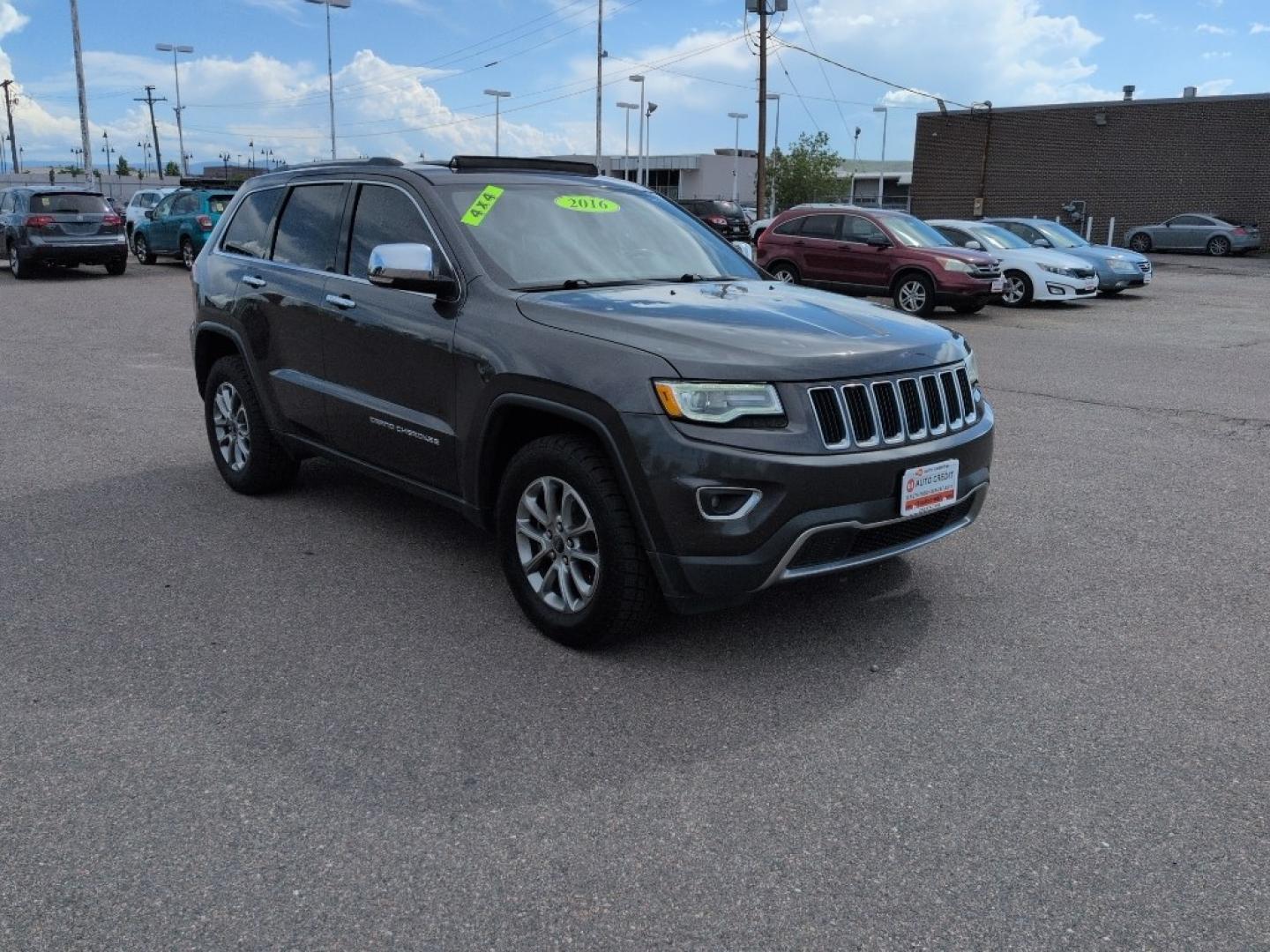 2016 GRAY Jeep Grand Cherokee LIMITED 4WD (1C4RJFBG6GC) with an V6, 3.6L engine, Automatic transmission, located at 10890 W. Colfax Ave., Lakewood, CO, 80215, (303) 274-7692, 39.739914, -105.120132- Photo#2
