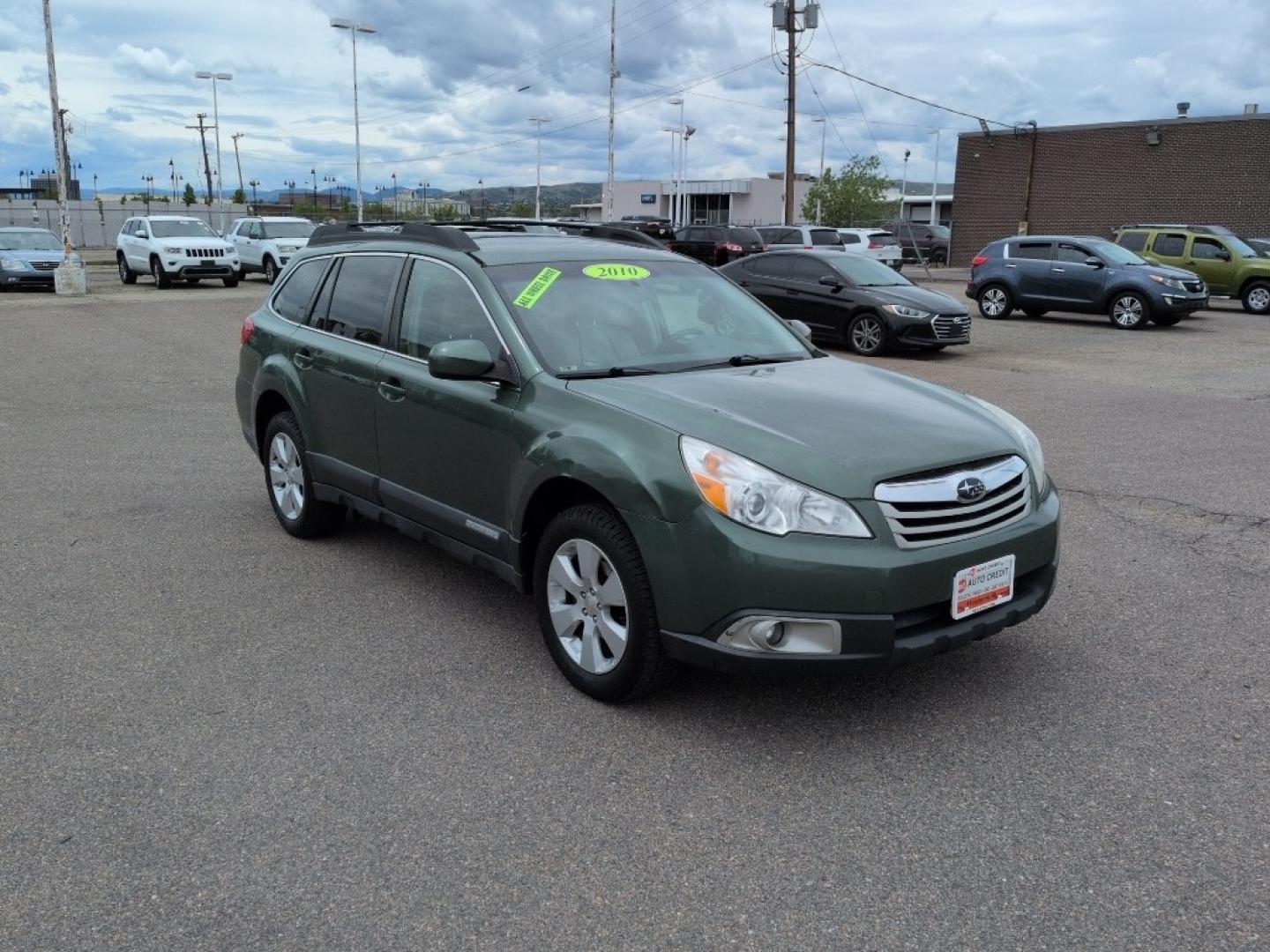 2010 GREEN Subaru Outback 2.5i Premium (4S4BRBBC7A3) with an 4 Cyl, 2.5L engine, Automatic transmission, located at 10890 W. Colfax Ave., Lakewood, CO, 80215, (303) 274-7692, 39.739914, -105.120132- Photo#2
