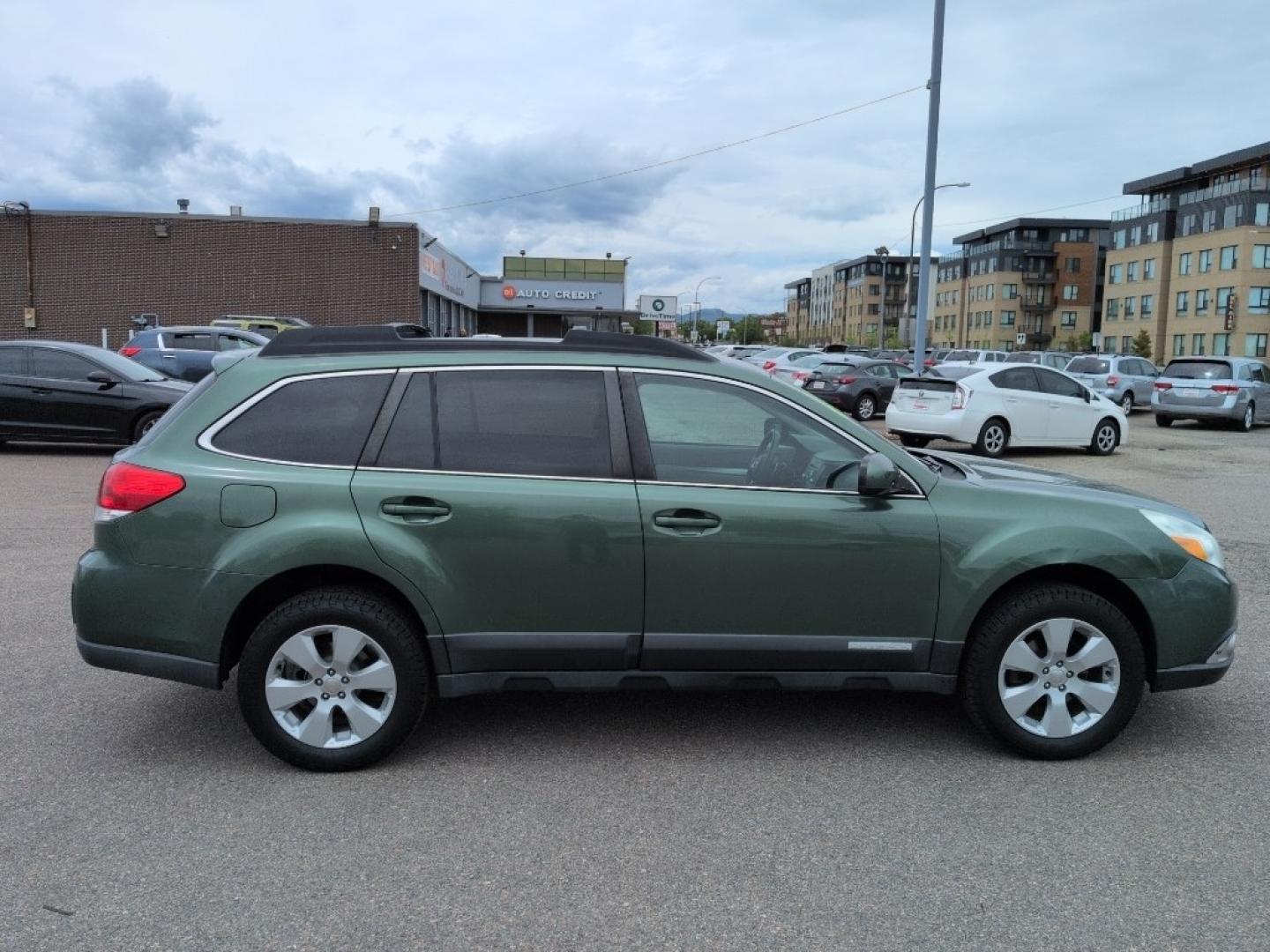 2010 GREEN Subaru Outback 2.5i Premium (4S4BRBBC7A3) with an 4 Cyl, 2.5L engine, Automatic transmission, located at 10890 W. Colfax Ave., Lakewood, CO, 80215, (303) 274-7692, 39.739914, -105.120132- Photo#3