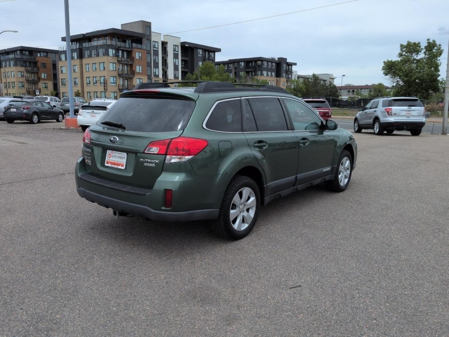 2010 GREEN Subaru Outback 2.5i Premium (4S4BRBBC7A3) with an 4 Cyl, 2.5L engine, Automatic transmission, located at 10890 W. Colfax Ave., Lakewood, CO, 80215, (303) 274-7692, 39.739914, -105.120132- Photo#4