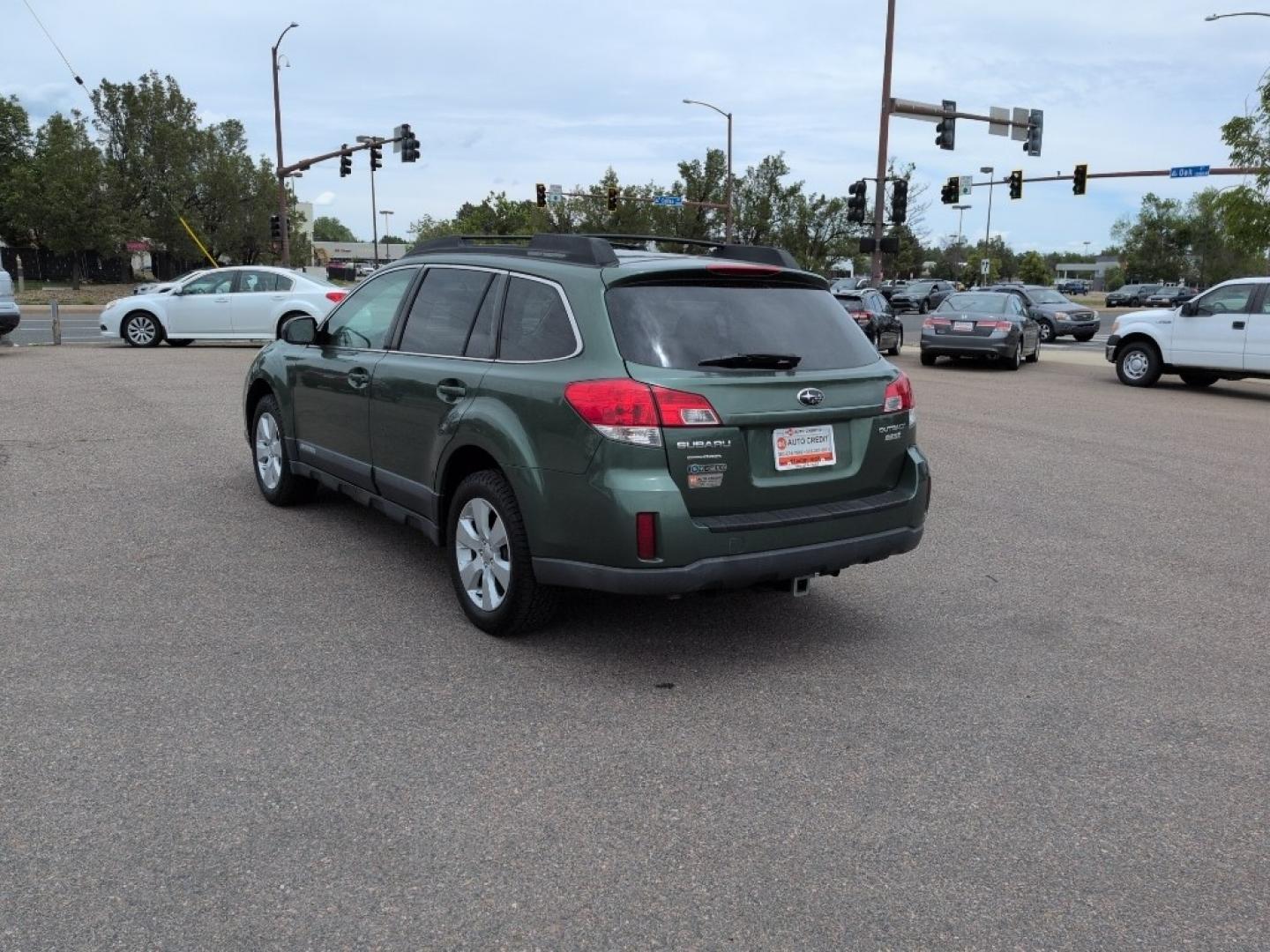 2010 GREEN Subaru Outback 2.5i Premium (4S4BRBBC7A3) with an 4 Cyl, 2.5L engine, Automatic transmission, located at 10890 W. Colfax Ave., Lakewood, CO, 80215, (303) 274-7692, 39.739914, -105.120132- Photo#6