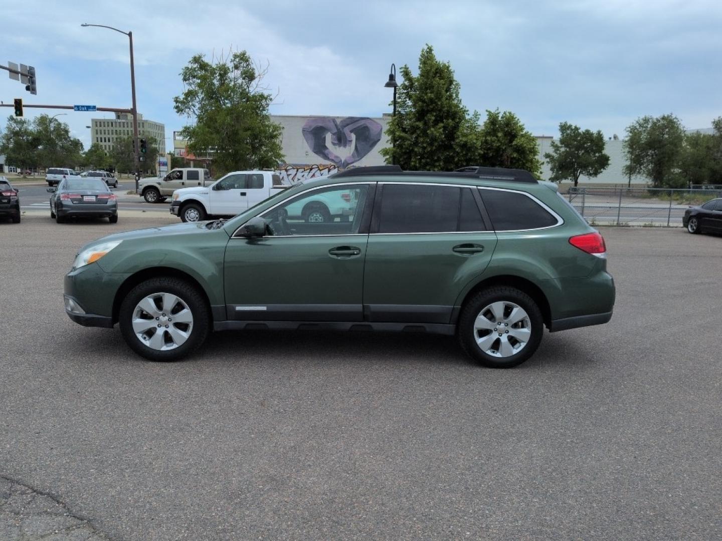 2010 GREEN Subaru Outback 2.5i Premium (4S4BRBBC7A3) with an 4 Cyl, 2.5L engine, Automatic transmission, located at 10890 W. Colfax Ave., Lakewood, CO, 80215, (303) 274-7692, 39.739914, -105.120132- Photo#7