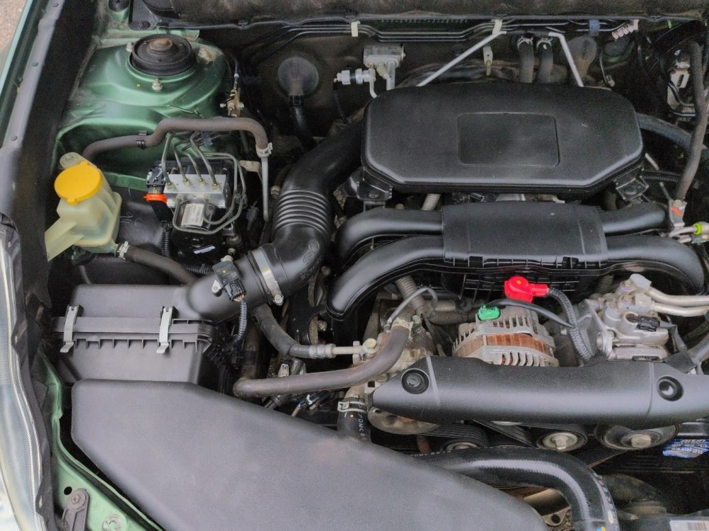 2010 GREEN Subaru Outback 2.5i Premium (4S4BRBBC7A3) with an 4 Cyl, 2.5L engine, Automatic transmission, located at 10890 W. Colfax Ave., Lakewood, CO, 80215, (303) 274-7692, 39.739914, -105.120132- Photo#23