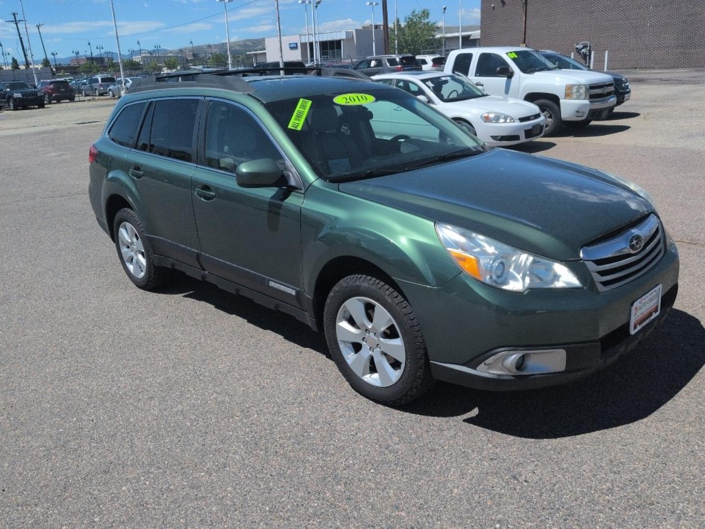 2010 GREEN Subaru Outback 2.5i Premium (4S4BRBBC7A3) with an 4 Cyl, 2.5L engine, Automatic transmission, located at 10890 W. Colfax Ave., Lakewood, CO, 80215, (303) 274-7692, 39.739914, -105.120132- Photo#2